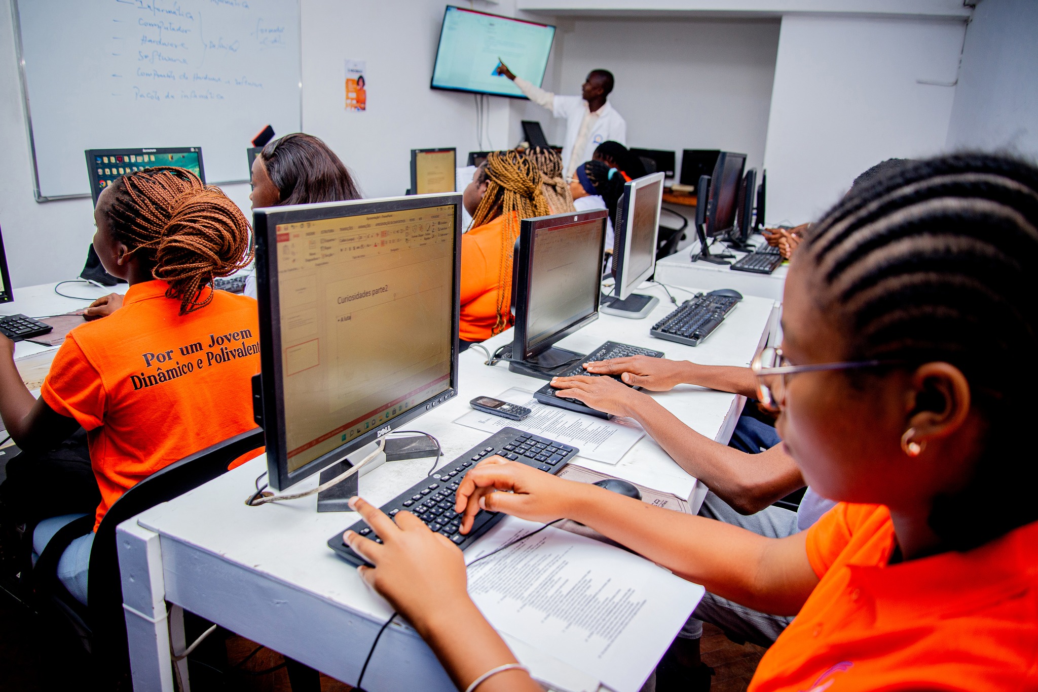Students inside class with computers